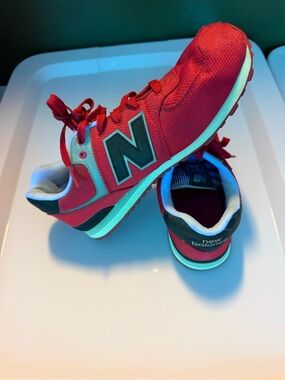 New Balance Women's Red Lace-Up Sneakers with Black 'N' Accent